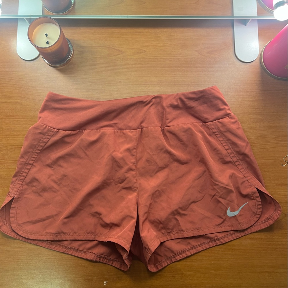 red nike shorts
